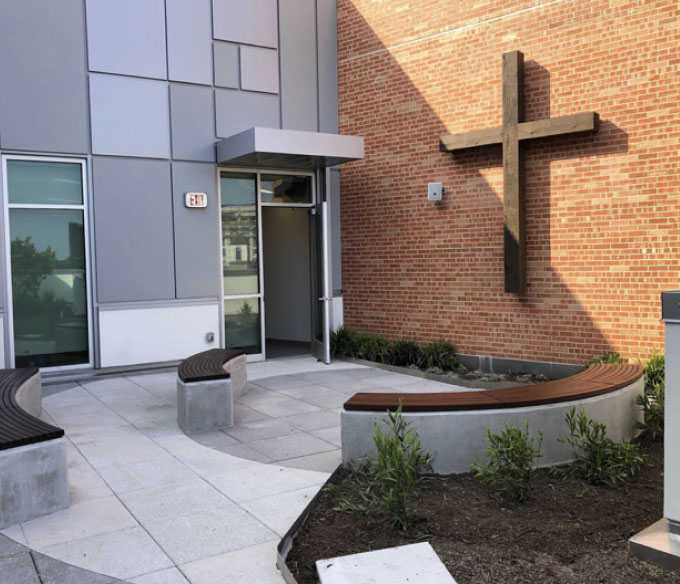 Large outdoor cross woodwork structure at a place of worship