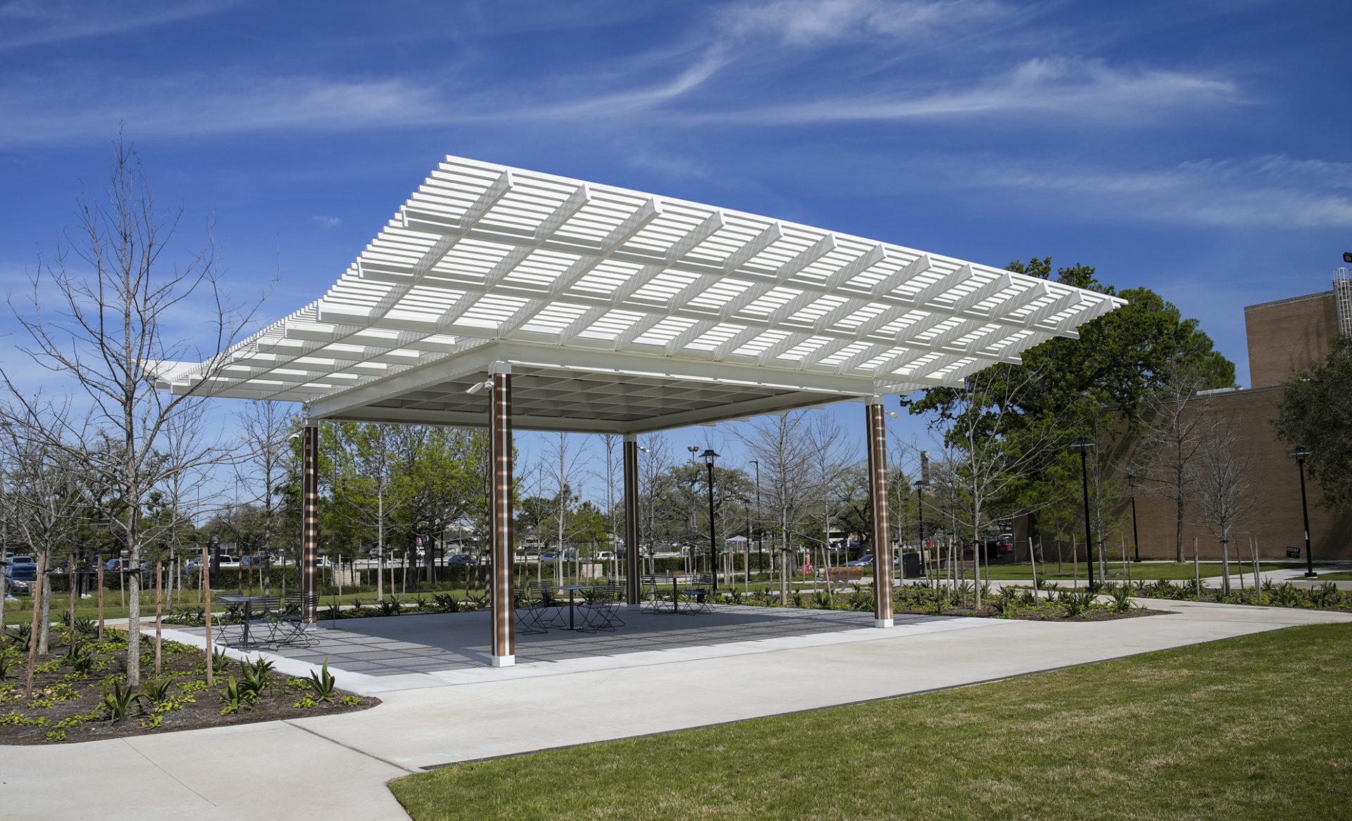 Rear view of the newly renovated Wilhelmina's Grove amphitheater featuring a custom carbon steel pavilion by Renfrow+Co.