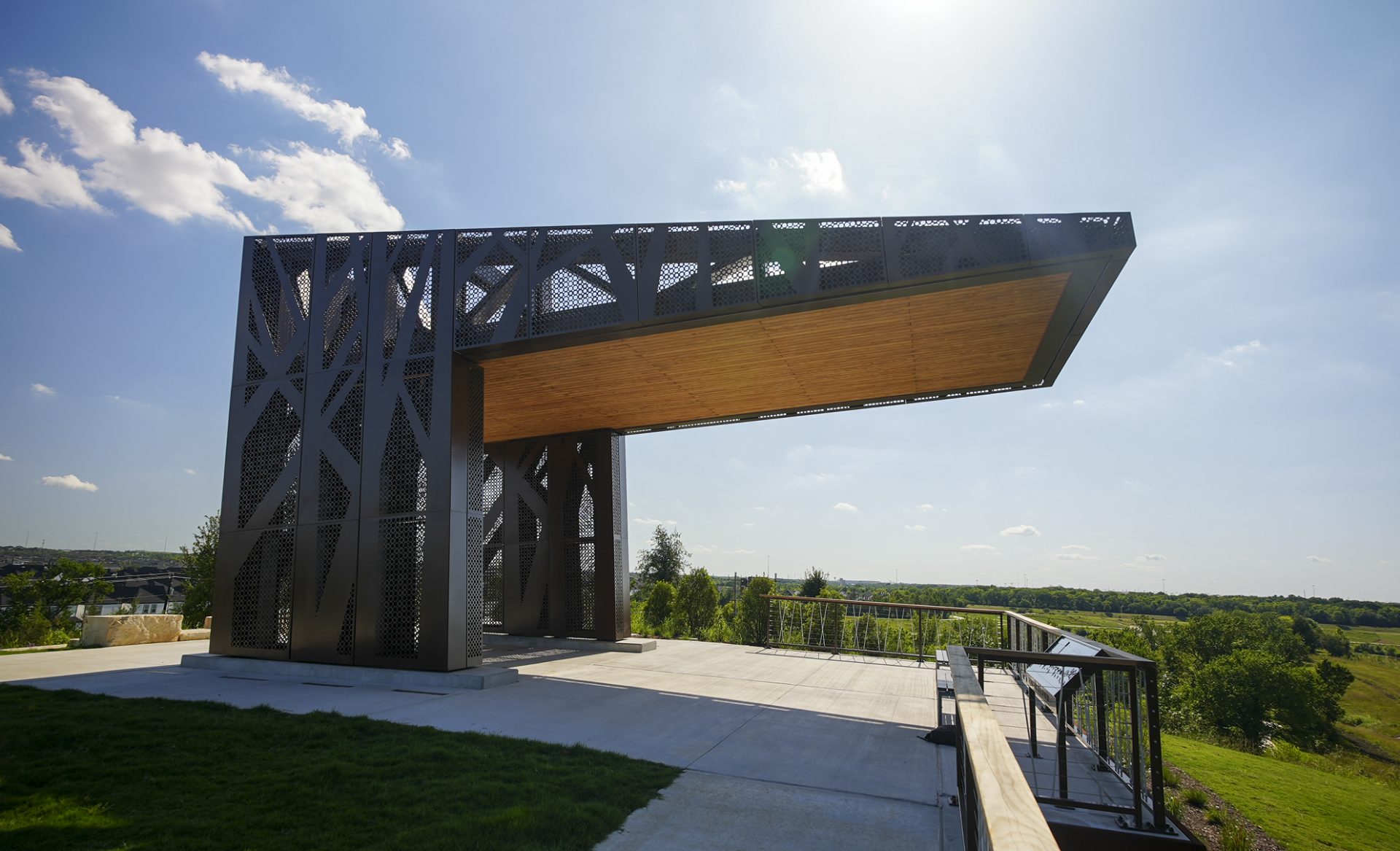 The Brown Foundation Hilltop Pavilion at Hill at Sims Park, featuring monumental custom metal fabrication by Renfrow+Co overlooking the Houston skyline. The Brown Foundation Hilltop Pavilion at Hill at Sims Park, featuring monumental custom metal fabrication by Renfrow+Co overlooking the Houston skyline.