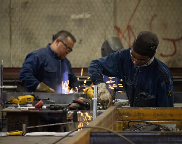 Renfrow+Co team completing custom metalwork